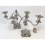 A pair of silver plate on copper twin branch table candelabra, height 23cm.