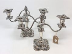 A pair of silver plate on copper twin branch table candelabra, height 23cm.