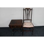 An antique chair together with a Regency style sofa table