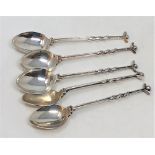 A set of five silver golf-themed teaspoons, Birmingham marks, 73.4g gross.