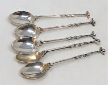 A set of five silver golf-themed teaspoons, Birmingham marks, 73.4g gross.