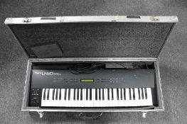 A Roland U-20 RS PCM electric keyboard in flight case