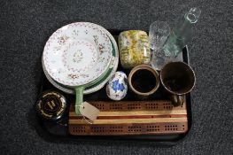 A tray of continental pottery, cribbage board,