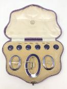 A fine quality cased silver gilt and purple enamel buckle, pair of shoe buckles, and six buttons,