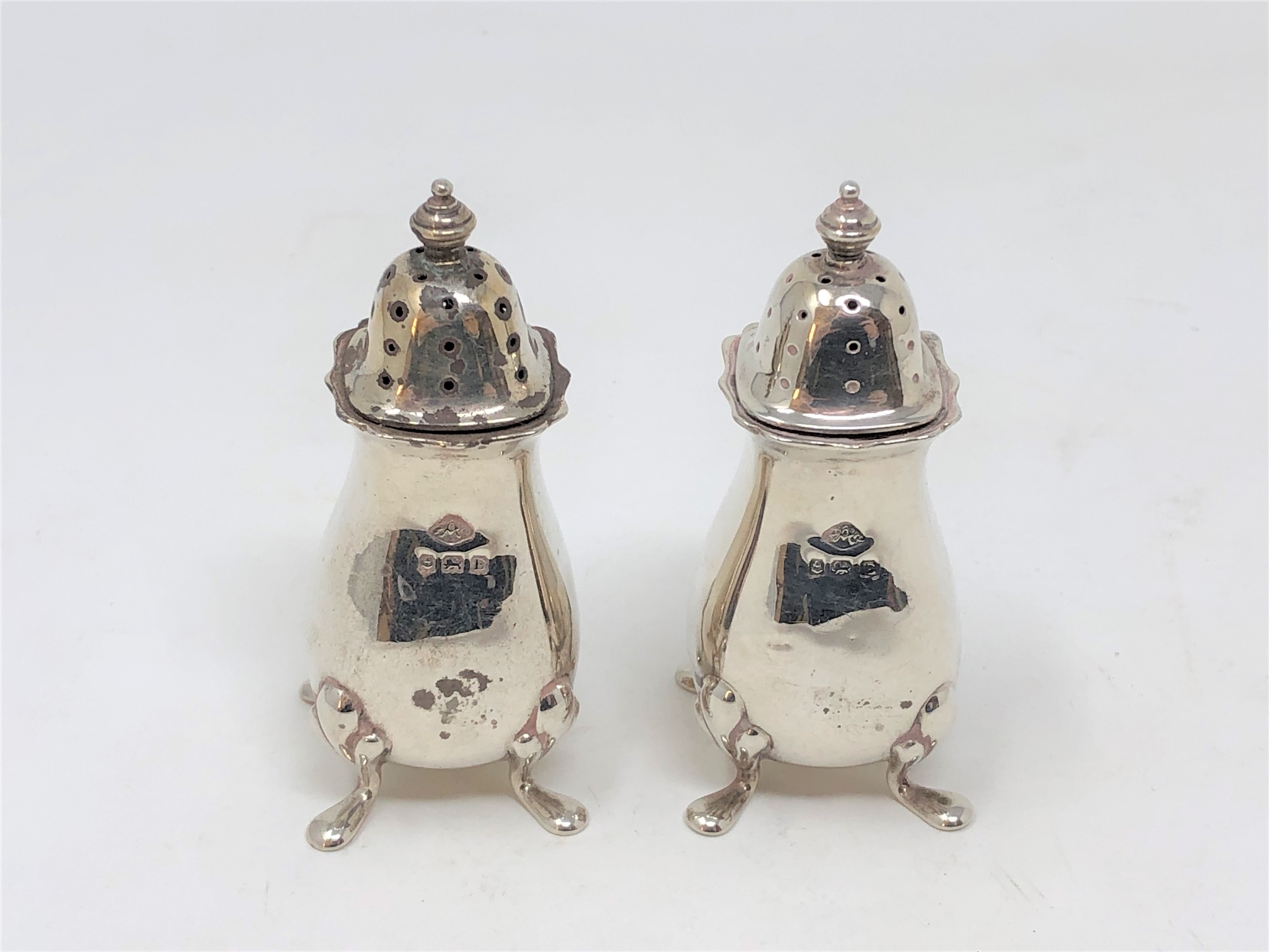 A pair of silver sifters