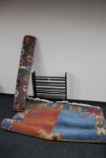 A wooden shoe rack together with two contemporary woolen rugs CONDITION REPORT: The