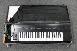 A Roland S-10 digital sampling keyboard in wooden case