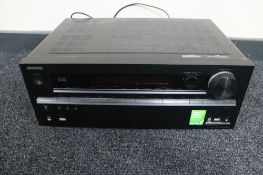 An Omkyo AV receiver model TX-NR609 with remote
