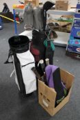 Two golf bags containing a set of Ben Sayers clubs and two further drivers and a box of assorted