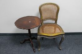 A mahogany tripod pedestal table together with a French bergere bedroom chair