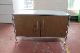 A contemporary metal double door office stationary cupboard