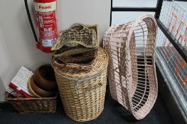 A quantity of wicker ware to include cot, laundry basket, picnic basket,