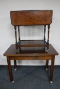 A mid century oak turn over top table and walnut flap sided serving trolley