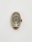 A vintage lady's gold Rolex wristwatch, numbered 483 58392, of Tonneau shape, the case,