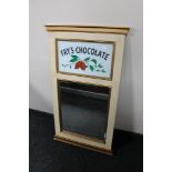 A contemporary framed hall mirror with hand painted Fry's Chocolate decoration