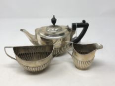 A three piece silver bachelor tea set, London 1911 CONDITION REPORT: 412g.