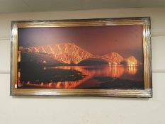 A framed print of a bridge scene