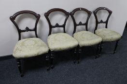 A set of four Victorian mahogany dining chairs