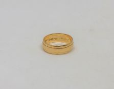 An 18ct gold band ring, size J CONDITION REPORT: 3.4g.