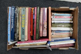 A box of 20th century books relating to dolls,