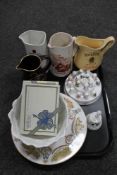 A tray of assorted whisky jugs, china thimbles on stand, two Villeroy and Boch ceramic plaques,