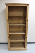 A set of Mexican pine open bookshelves