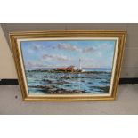 A gilt framed oil on canvas of St Mary's Island by Ray Smith