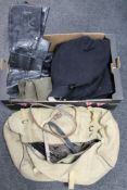 A box of military clothing, canvas carry bag, leather straps,