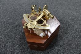 A brass ship's sextant in fitted wooden box