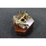 A brass ship's sextant in fitted wooden box