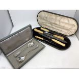 A Joseph Rogers & Sons cased five piece carving set with silver ferrules,