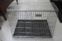 A folding metal dog cage