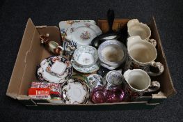 A box of antique and later china, chintz water jugs, tea china, cow creamer,