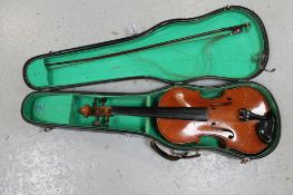 A 20th century violin and bow in carry case CONDITION REPORT: Back 14".