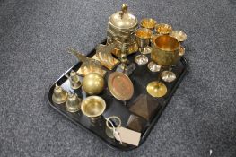 A tray of antique and later brass ware, three graduated pyramids, miniature tankard, goblets,