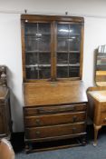 An Edwardian oak bureau bookcase