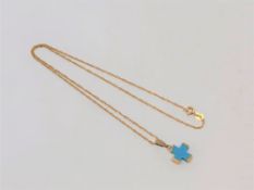 A 14ct gold mounted cross pendant on rope twist chain CONDITION REPORT: 2.4g.