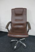 An executive swivel office armchair