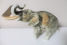 A Royal Dux figure of an Elephant