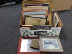 A box of assorted pictures and prints,