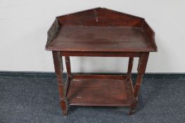 An antique painted pine two tier washstand
