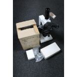 A Zenit Microlab series electric microscope with accessories