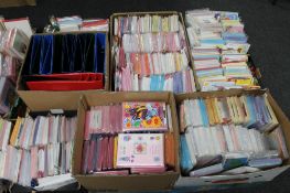 A pallet of seven boxes of assorted greetings cards together with a box A4 files