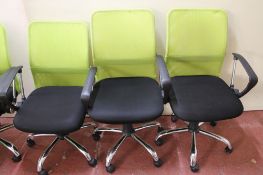 A pair of tow-tone Niceday swivel adjustable office armchairs and a matching typist chair