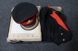 A box of three piece British military formal dress uniform with cap