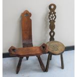 A rustic pine spinning chair together with a carved spinning chair