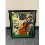 A framed violin montage, width 49.