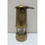 A brass Welsh miner's lamp