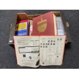 A box of stamp reference book and album of stamps,