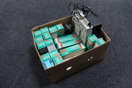 A box of Kindermann projector together with a large quantity of slide boxes